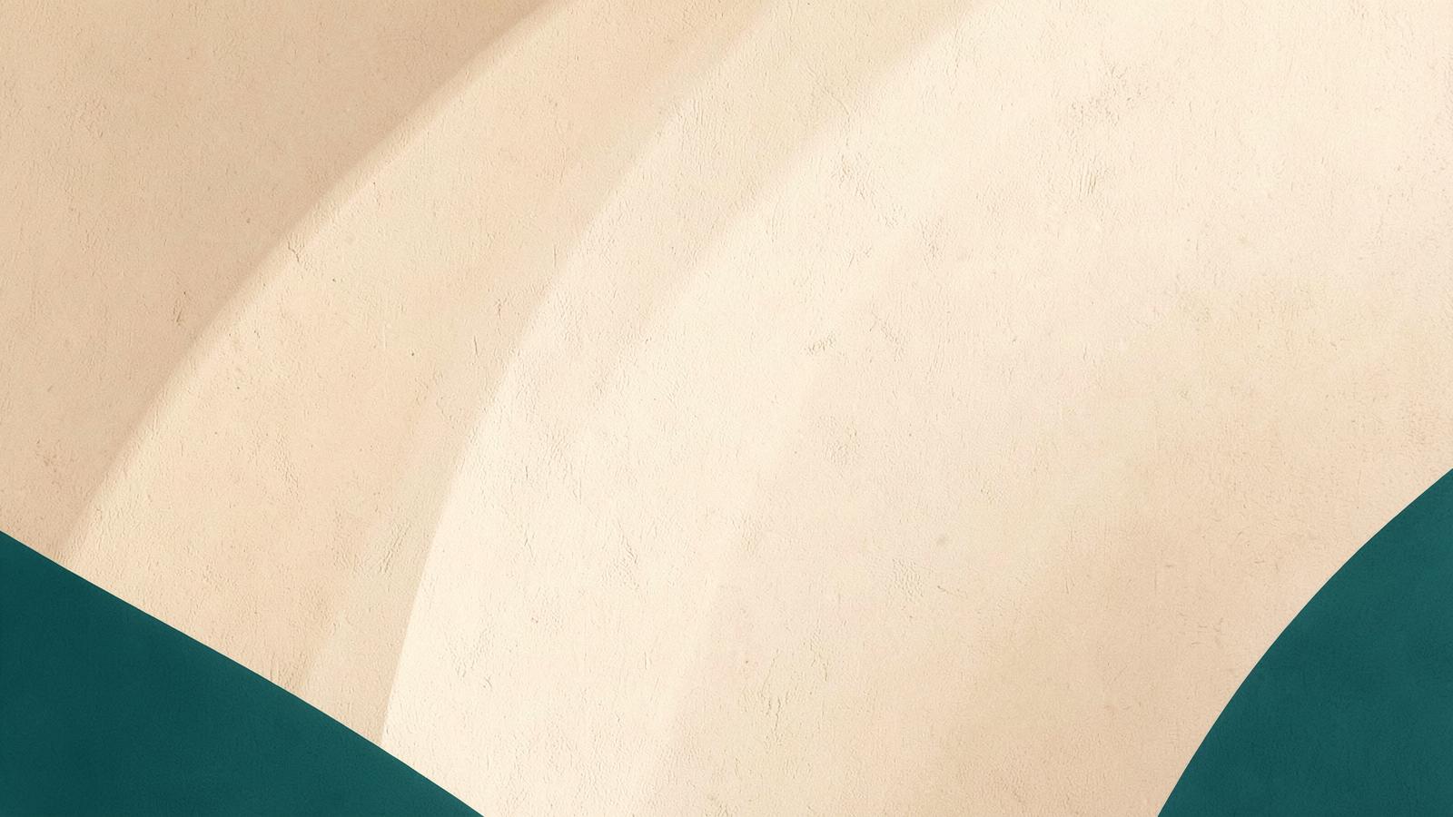 Soft warm plaster wall with gentle curved shadows in cream and teal